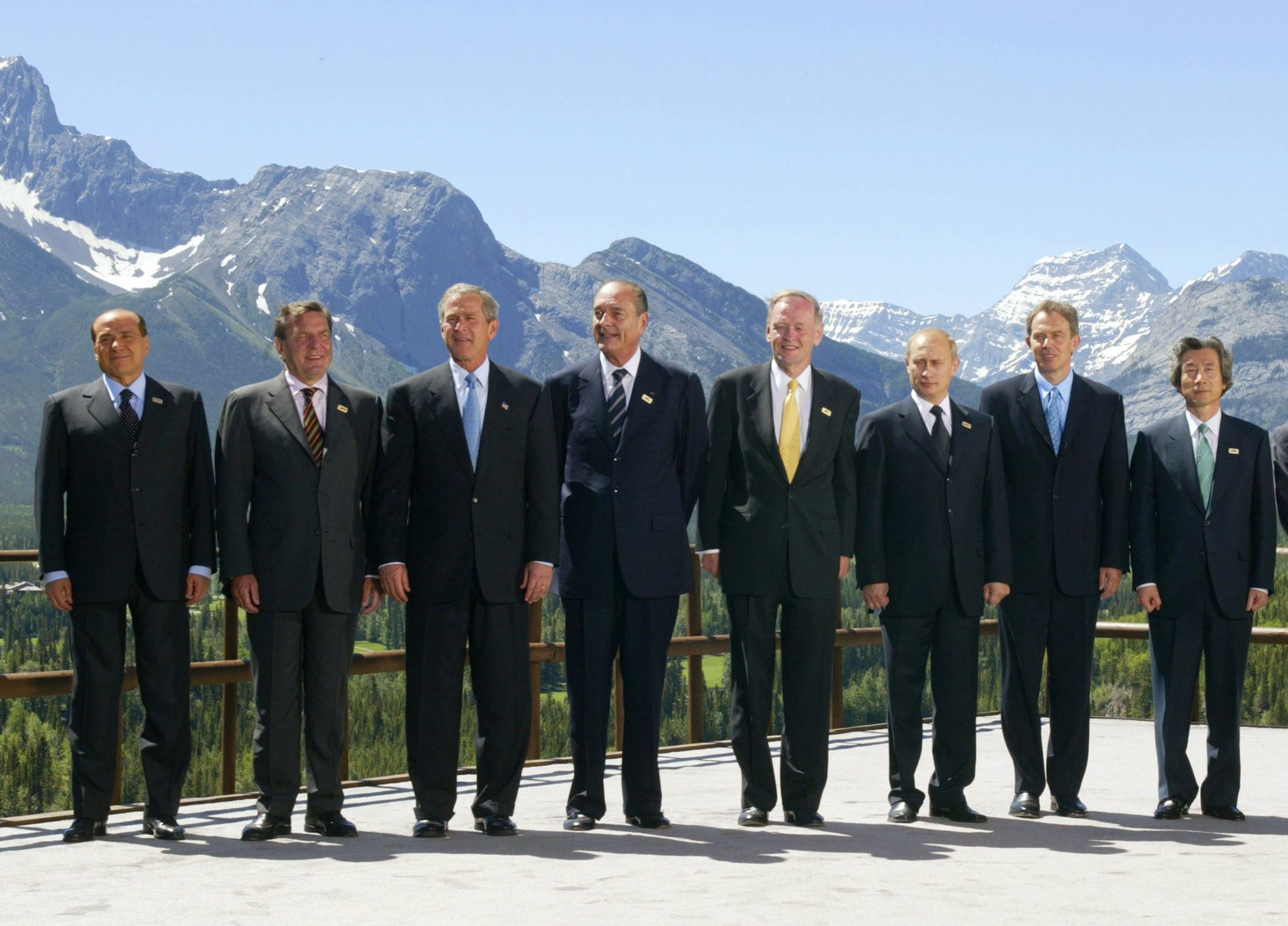  Leaders at the 2002 G8 Summit in Kananaskis, Alberta. Left to right: Silvio Berlusconi, Gerhard Schroeder, George W. Bush, Jacques Chirac, Jean Chretien, Vladimir Putin, Tony Blair and Junichiro Koizumi