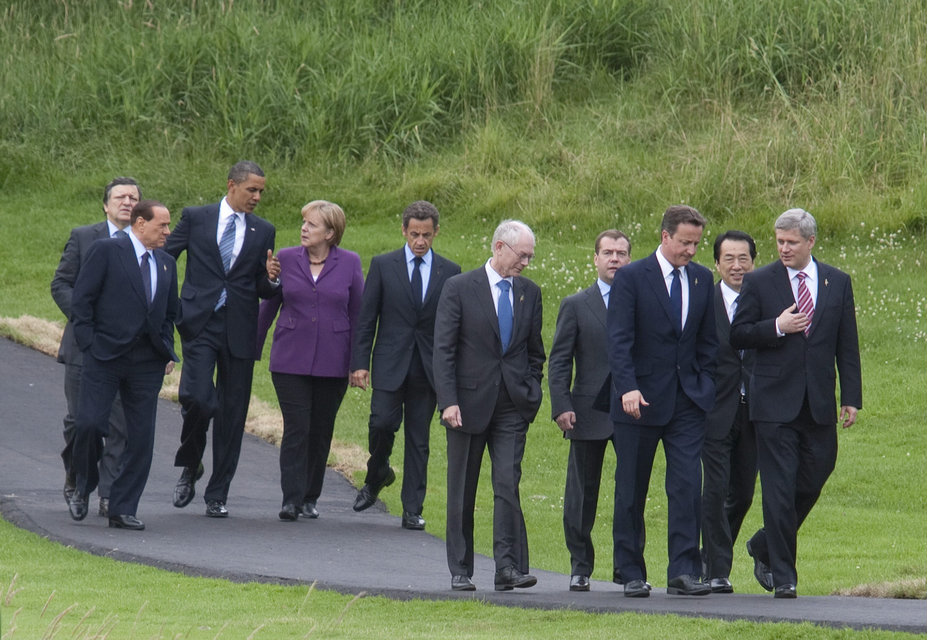 G7 leaders along with European Commission and European Union Presidents, walking to the family photo location
